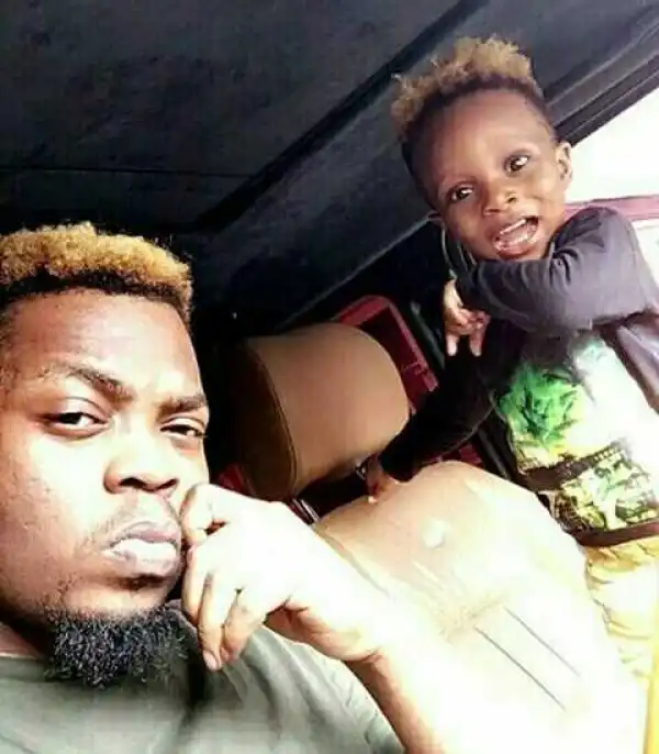 Olamide has finally opened up why he dyed his son head